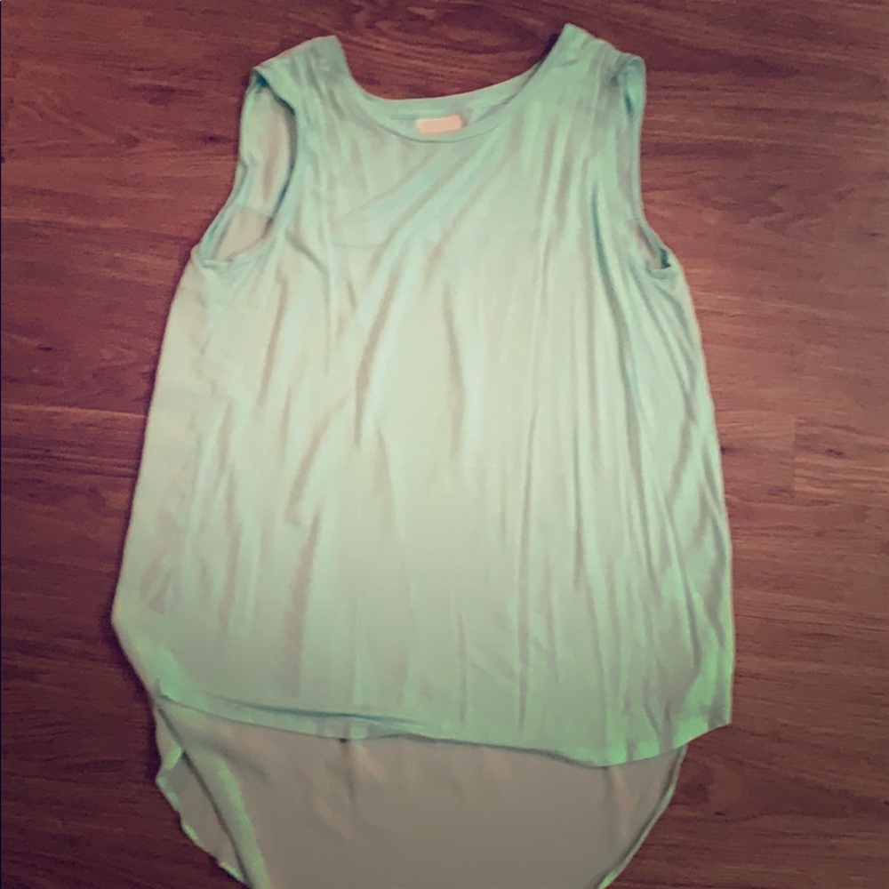 Light turquoise blouse size medium no sleeves